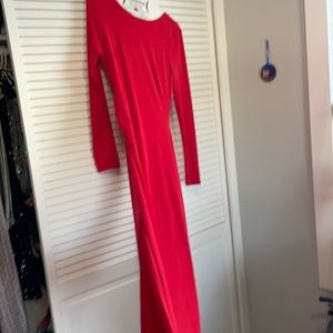 Floor length Red long sleeve dress gold ring in back and side slit